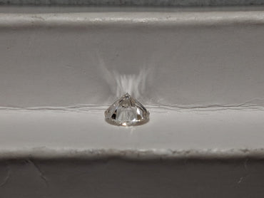0.77 CT Natural Round Cut IJ Light Undertone I1