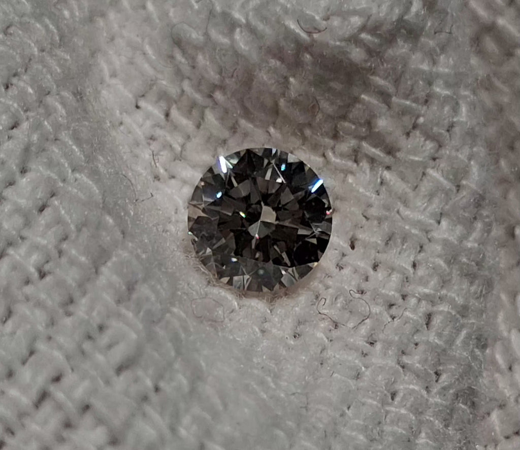 GIA 0.50 CT Natural Round N VVS1 Slight Brown