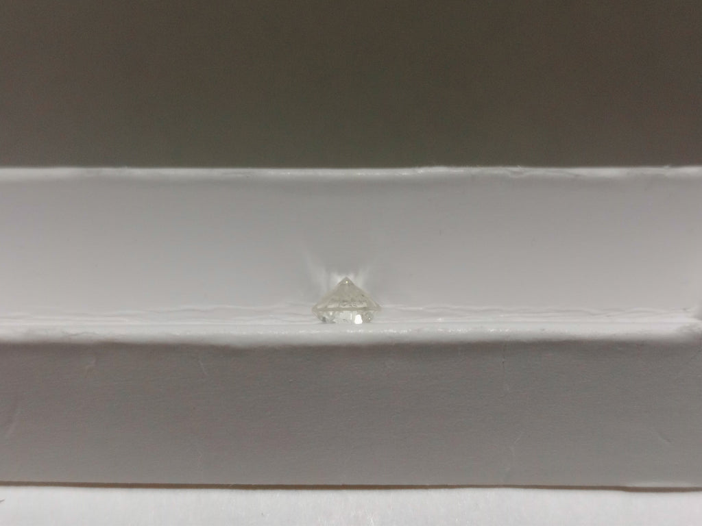 0.81 CT Round Brilliant Natural Diamond L-M SI2-I1