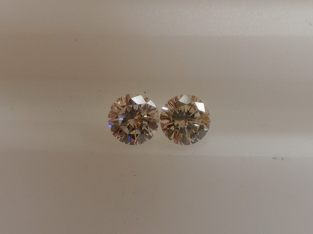 2 Round Brilliant Diamonds .64 TCW H-J SI Goods