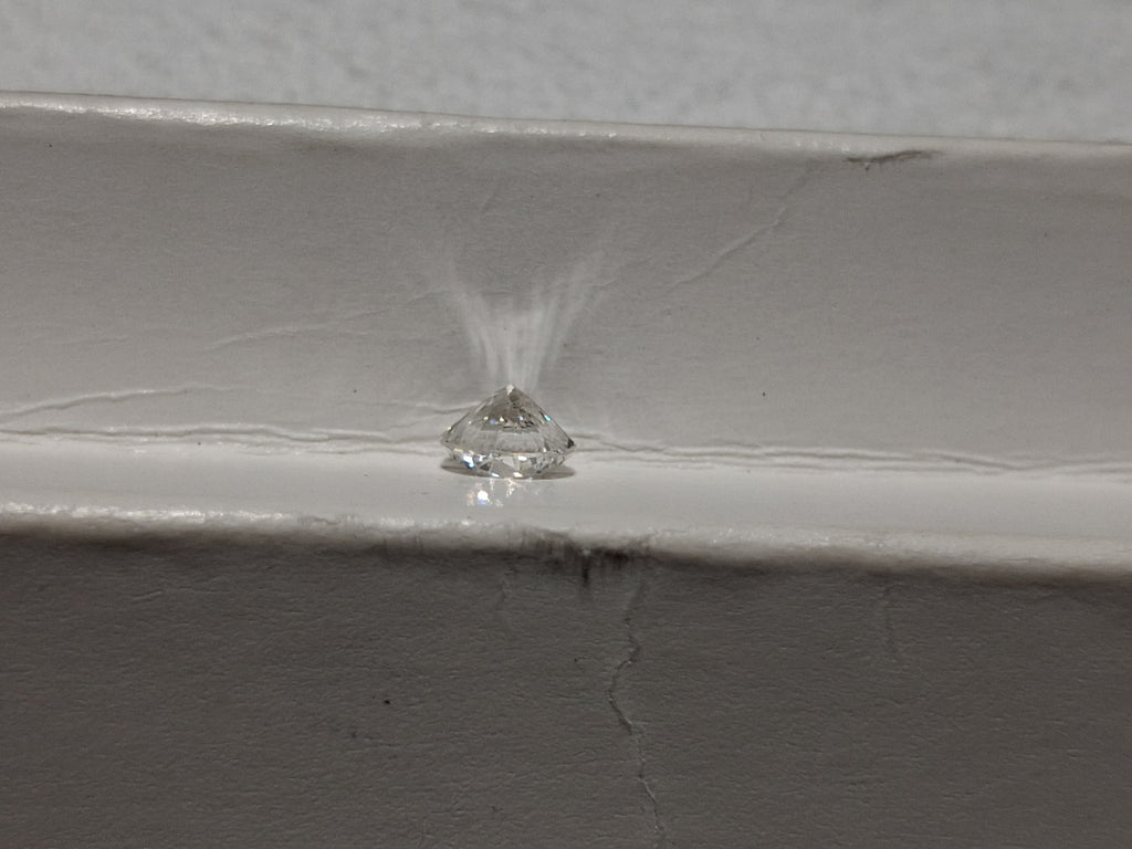 0.53 CT Natural Flower Cut FG SI2