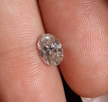 IGI 1.04 CT Natural Oval Brilliant K Grey I1 VG VG G