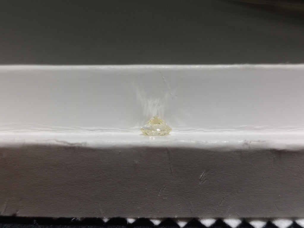 0.73 CT Round Brilliant Natural Diamond O-P Imperfect