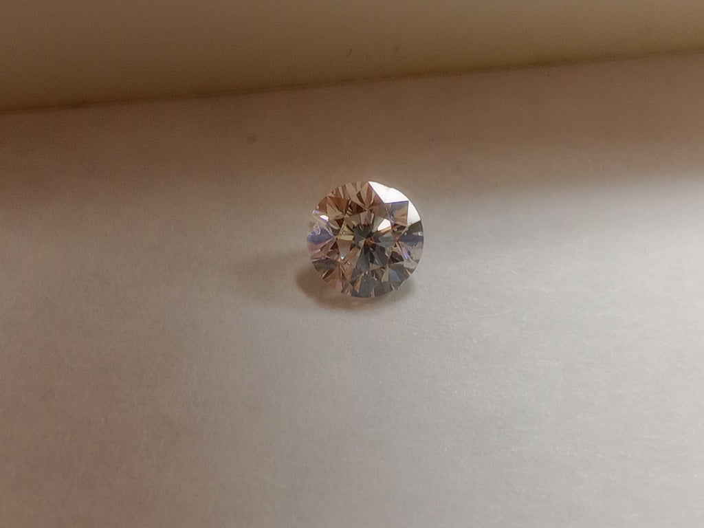 0.61 CT Natural Round Brilliant IJ I1