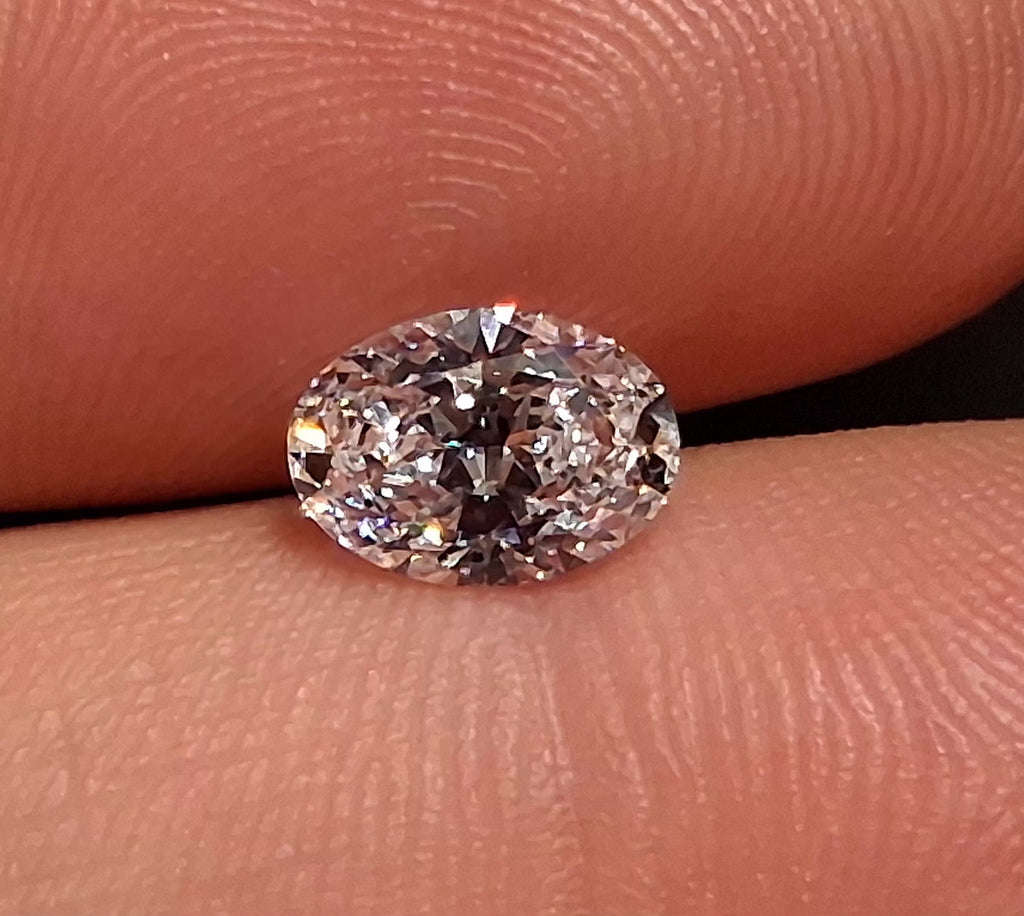 GIA 0.91 CT Natural Oval Brilliant E SI2 XX