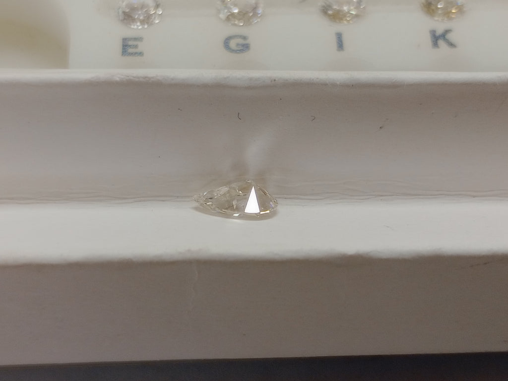 0.78 CT Natural Pear Shape L I1