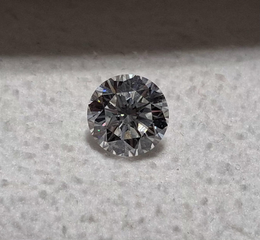 0.78 CT Natural Round Brilliant Cut E-F VS1