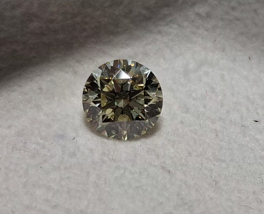 1.21 CT Natural Round Brilliant Pretty Yellow SI1-SI2