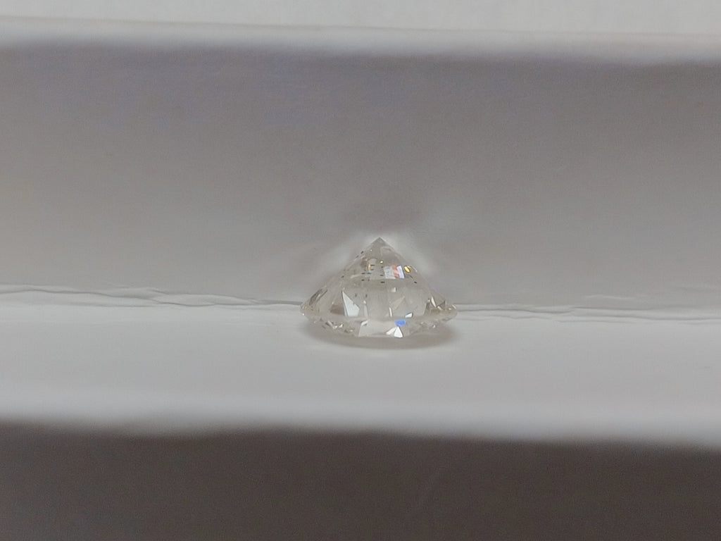 0.73 CT Natural Round Brilliant J SI2