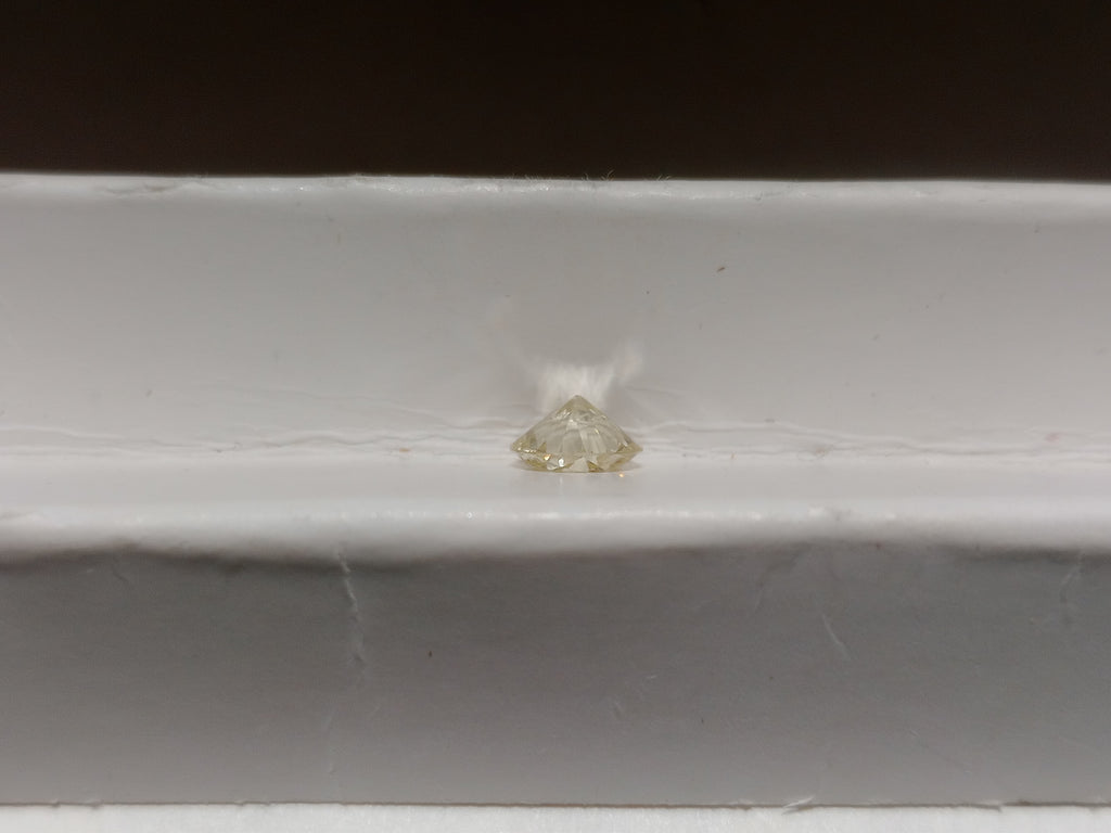 0.59 CT Round Brilliant Natural Diamond M-N VS