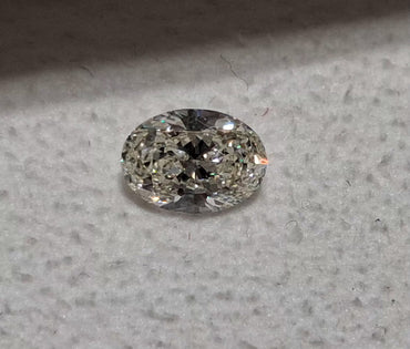GIA 0.70 CT Natural Oval K SI2