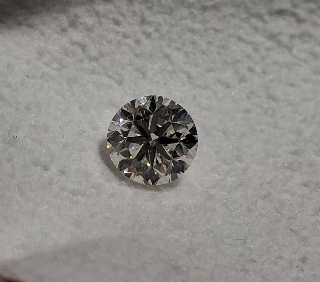 GIA 0.90 CT Natural Round Brilliant J VS1