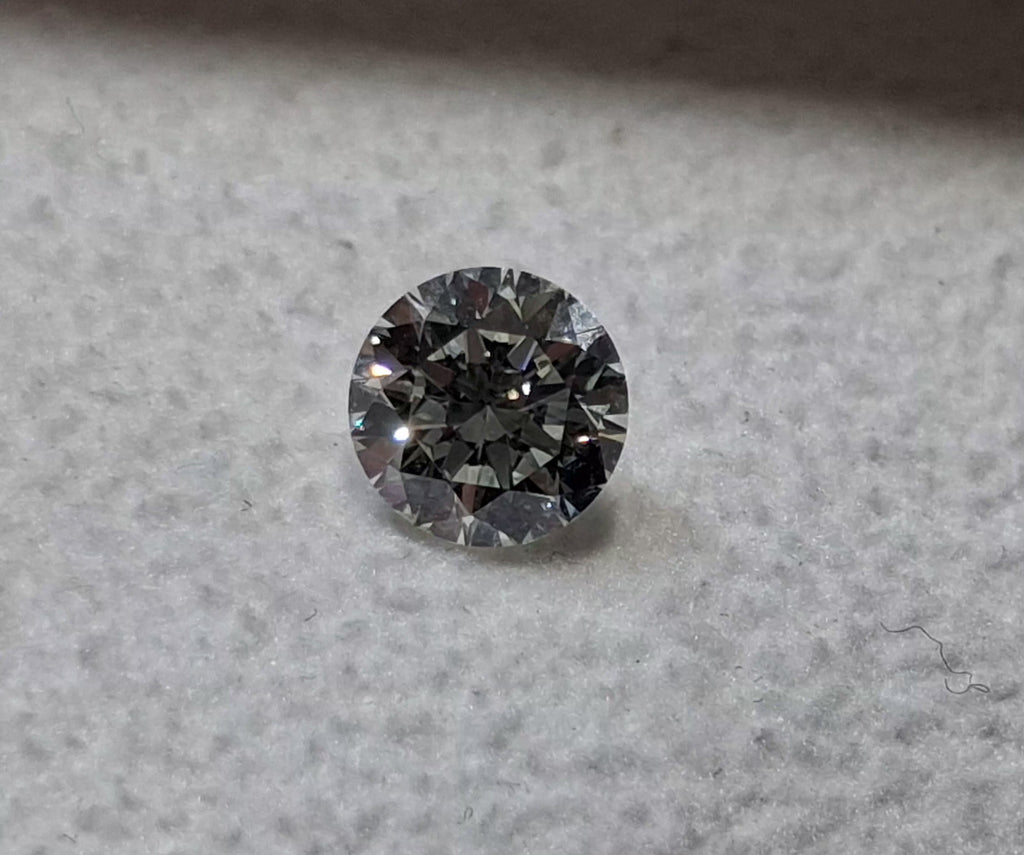 GIA XXX 0.70 CT Natural Round Brilliant K SI1