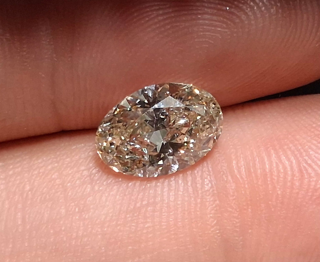 IGI 2.01 CT Natural Oval Brilliant Q-R SI2 VG EX VG