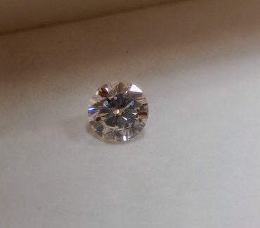 0.60 CT Natural Round Brilliant HI VS
