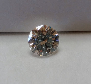0.73 CT Natural Round Brilliant J SI2