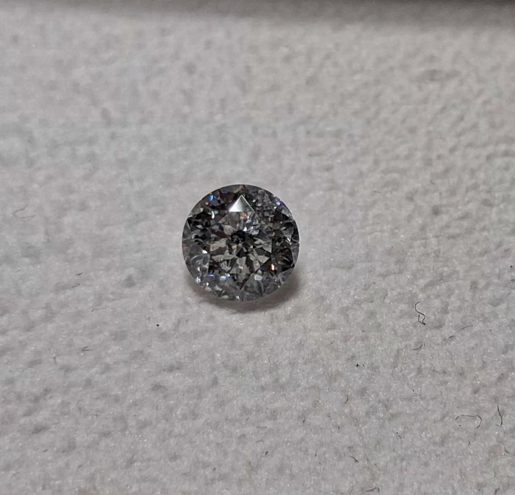 0.53 CT Natural Flower Cut FG SI2