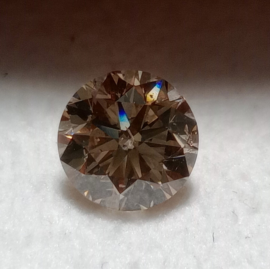 2.01 CT IGI Round Brilliant Natural Diamond Light Brown SI2 XXX
