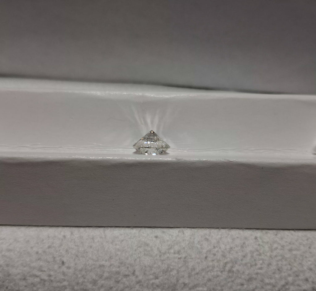 IGI 1.51 CT Natural Round G SI2 XXX