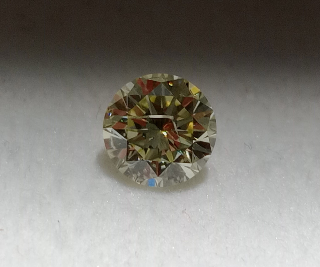 0.73 CT Round Brilliant Natural Diamond O-P Imperfect