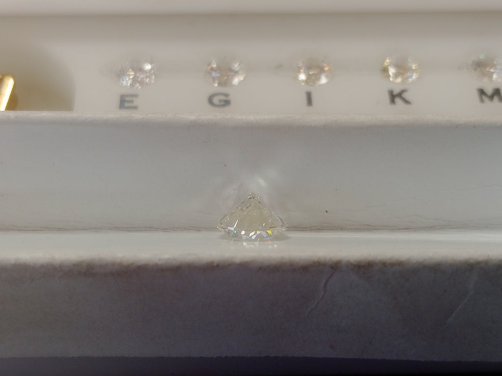 GIA 1.56 Round Brilliant Natural Diamond, K, I1 -55