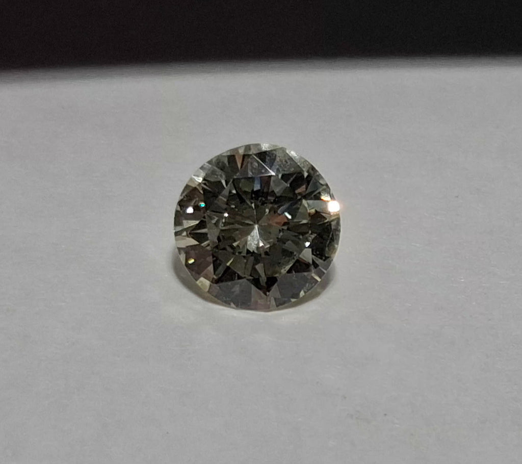 0.75 CT Natural Round Cut MN VS