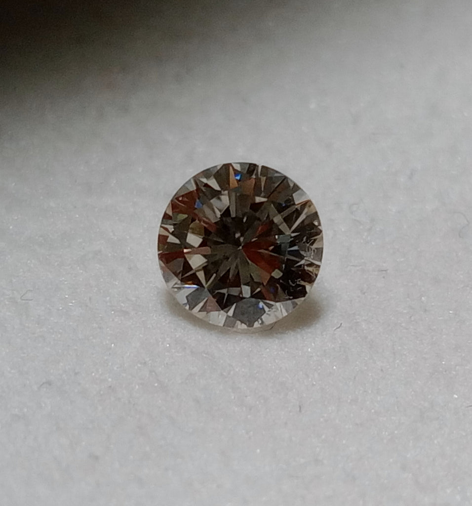 0.58 CT Round Brilliant Natural Diamond M-N SI1-SI2
