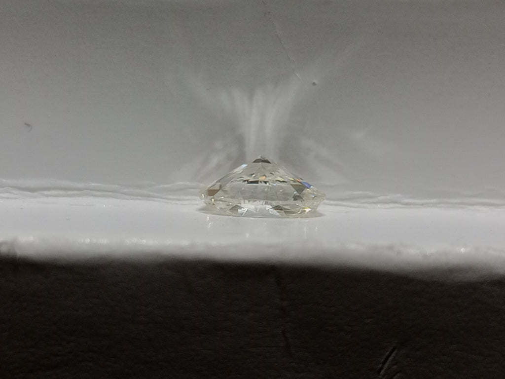 0.71 CT GIA Oval Shaped Natural Diamond K SI1