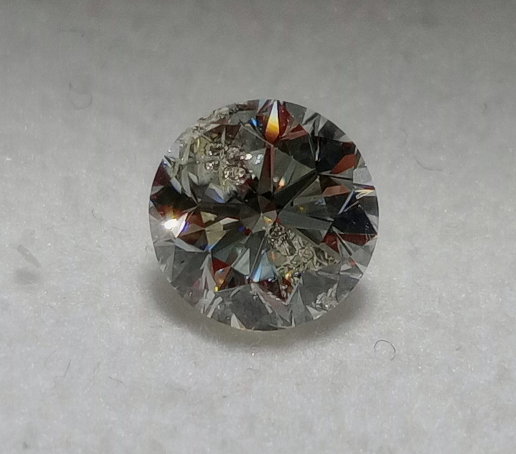 0.97 CT Round Brilliant Natural Diamond J I1-I2