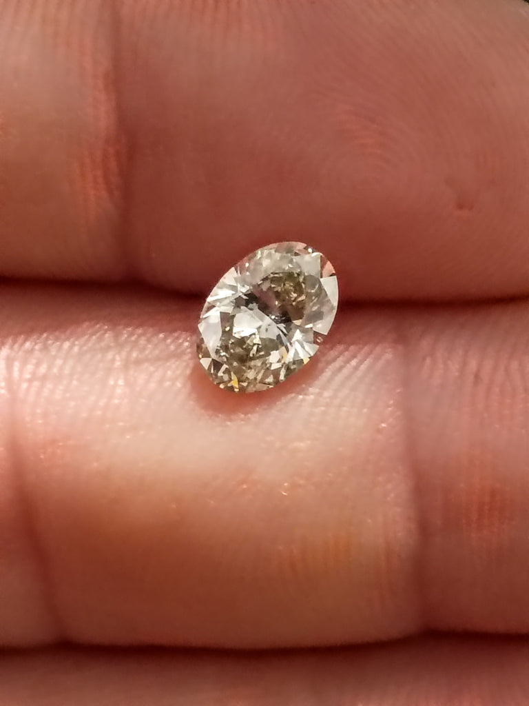 GIA 1.12 CT Natural Oval Brilliant M SI2 EX VG