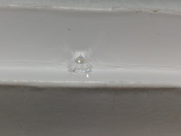 0.59 CT Round Brilliant Natural Diamond G-H SI1 Chipped