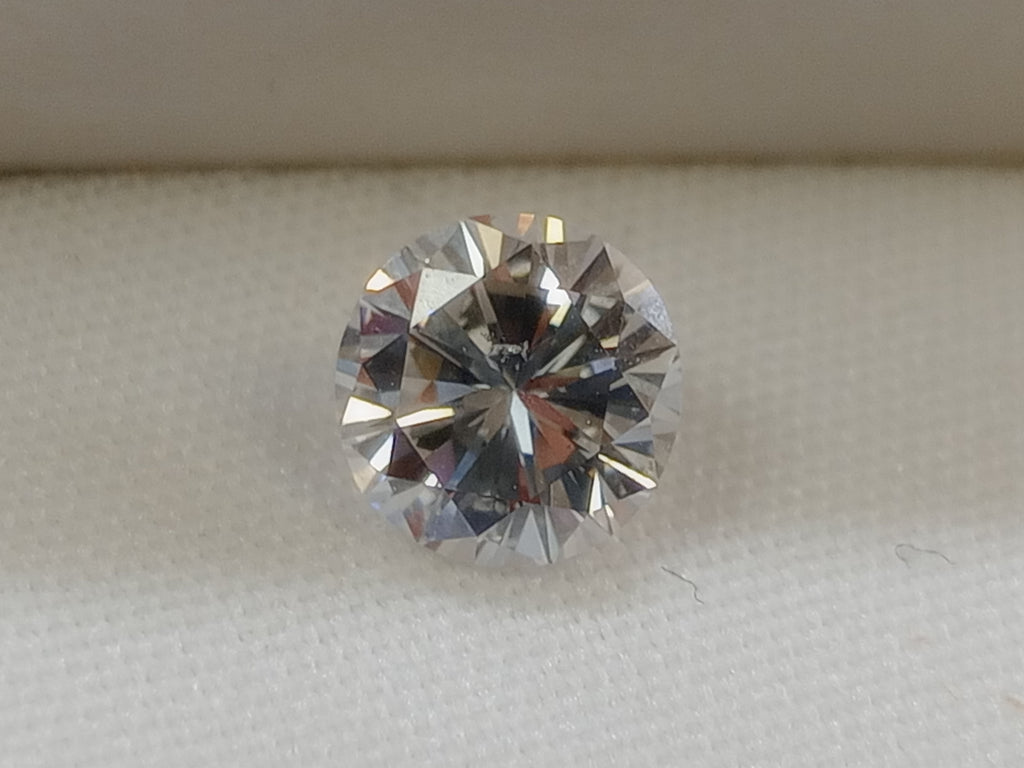 0.73 CT Natural Round Brilliant G SI2