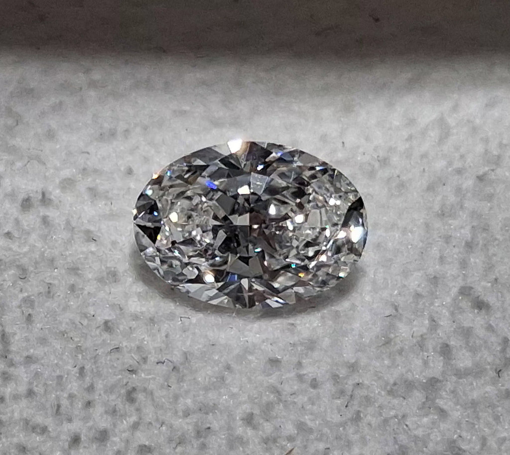 GIA 0.91 CT Natural Oval Brilliant E SI2 XX