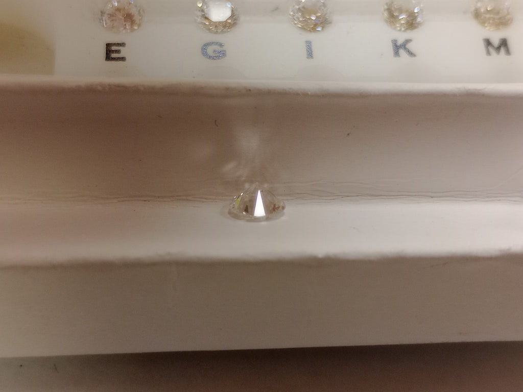 0.60 CT Natural Round Brilliant HI VS