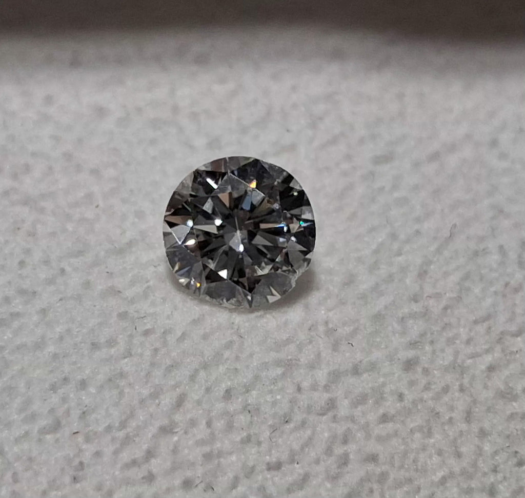 0.75 CT Natural Round Brilliant H-I VS Chipped