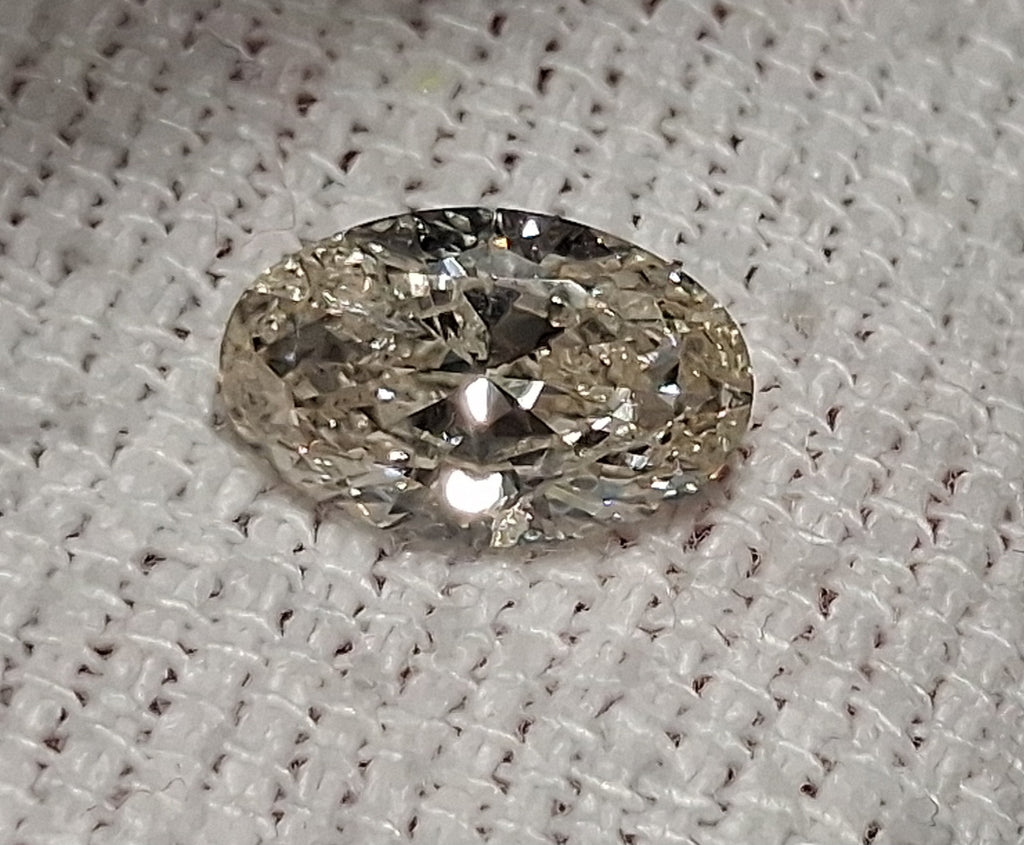IGI 1.52 CT Natural Oval K I1 VG-EX-EX