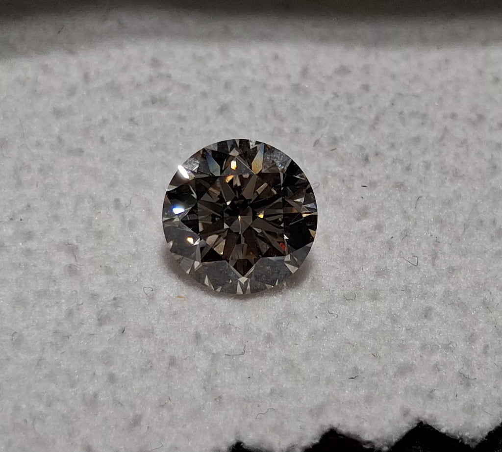 GIA 1.29 CT Natural Round Brilliant ST Light Brown VS2 XXX