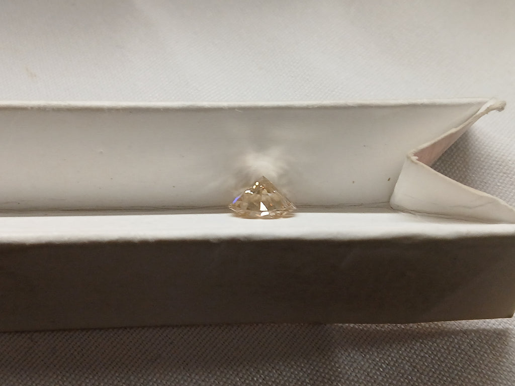 1.08 CT Natural Round Brilliant Brown Imperfect chipped