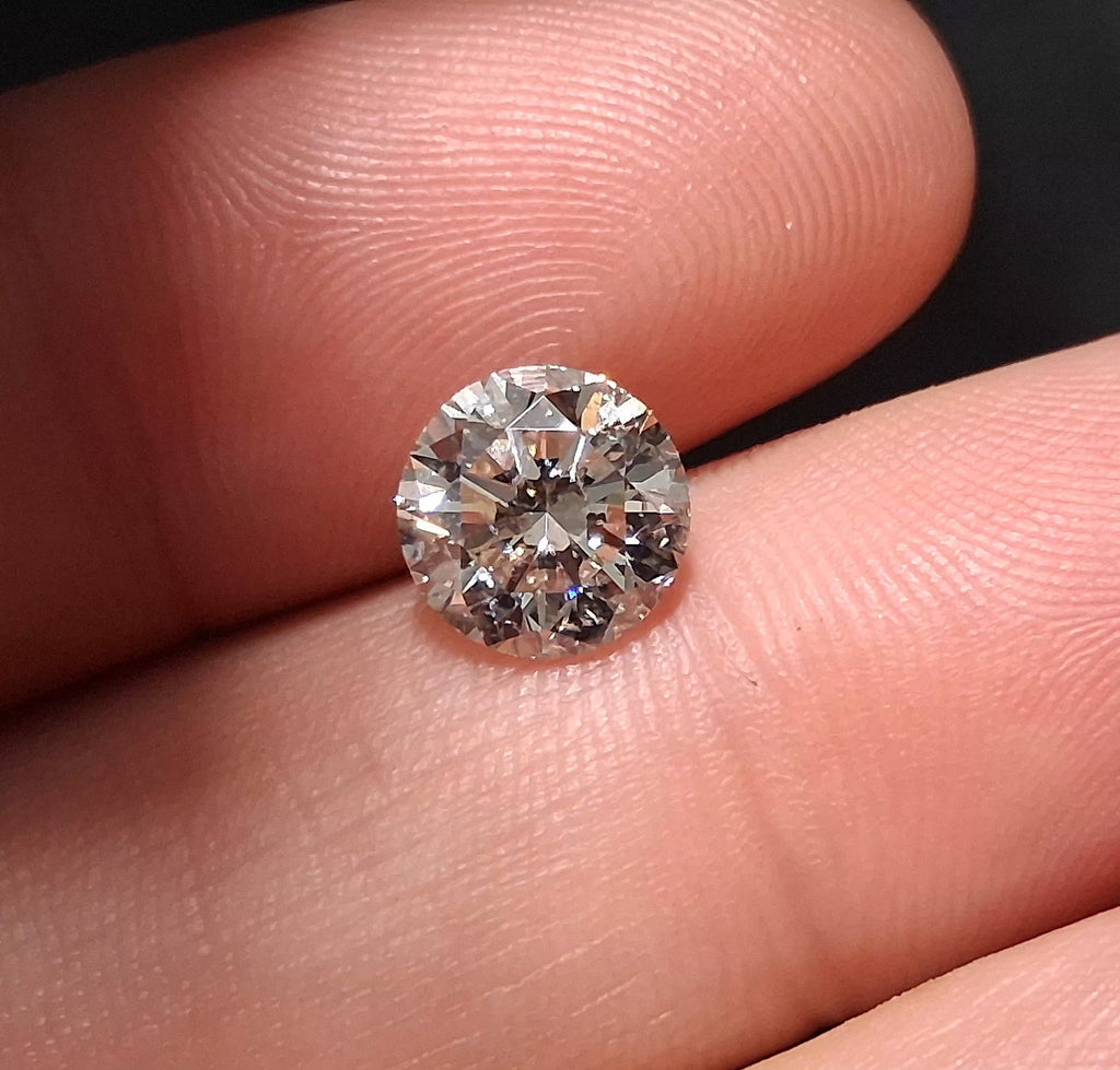 IGI 2.02 CT Natural Round Brilliant K I1 XXX