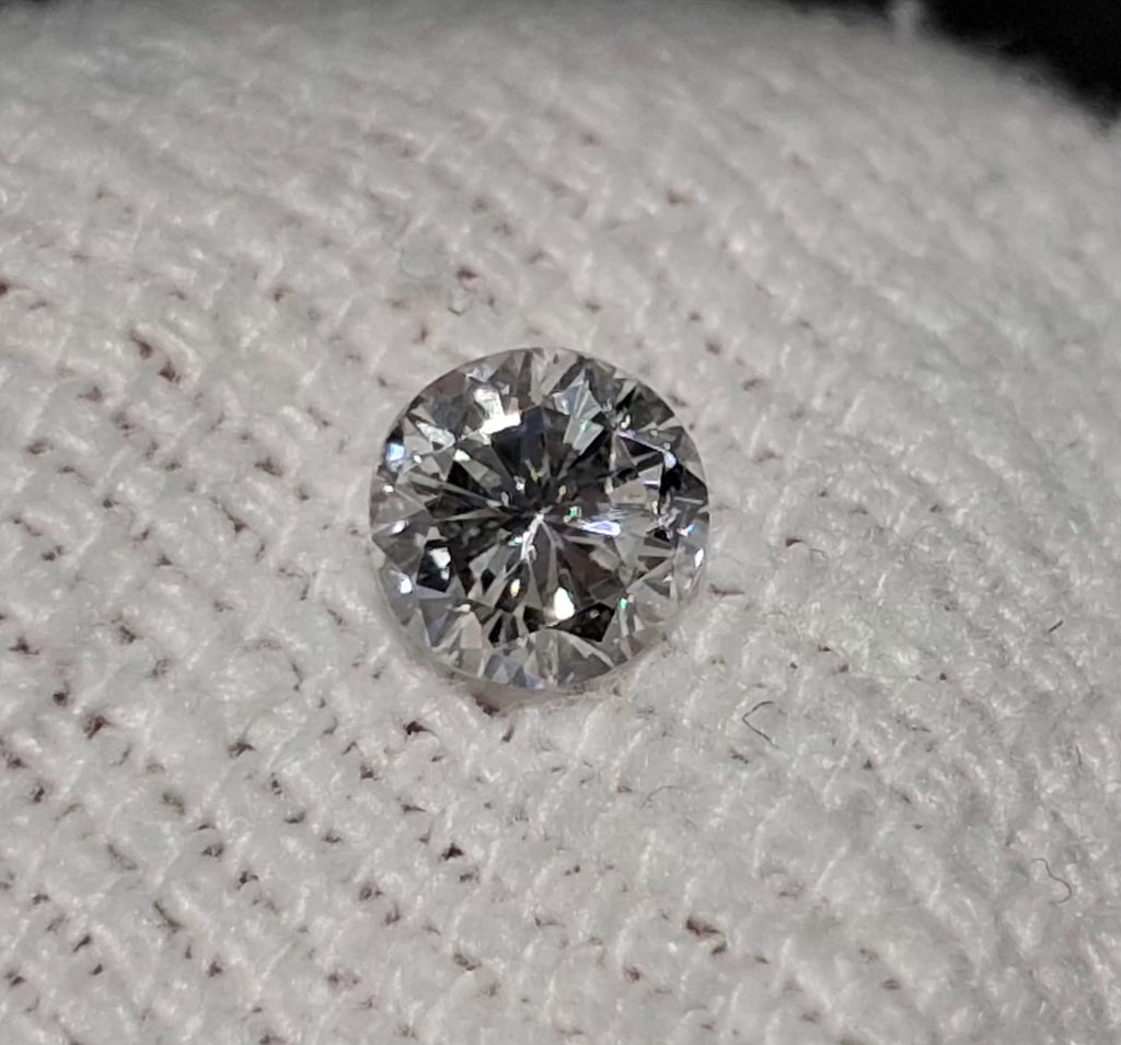 0.63 CT Natural Round Brilliant Cut FG I1