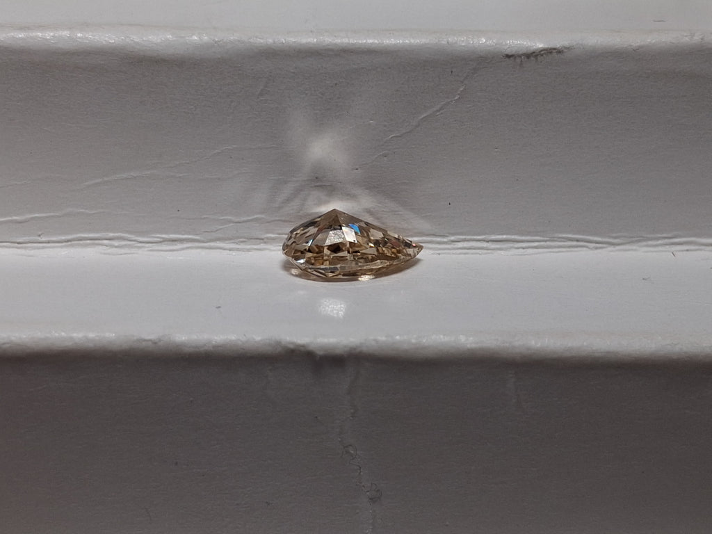 1.01 CT Natural Pear Cut Light Brown SI1