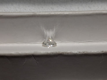 0.78 CT Natural Round Brilliant FG SI1 Chipped