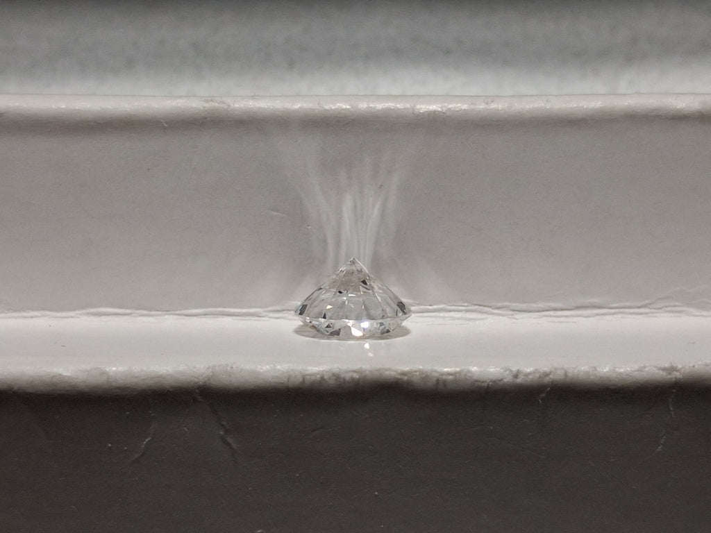 GIA 1.25 CT Natural Round Brilliant E SI1