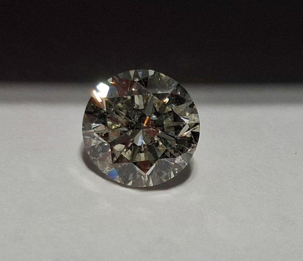 IGI 2.02 CT Natural Round Brilliant K I1 XXX