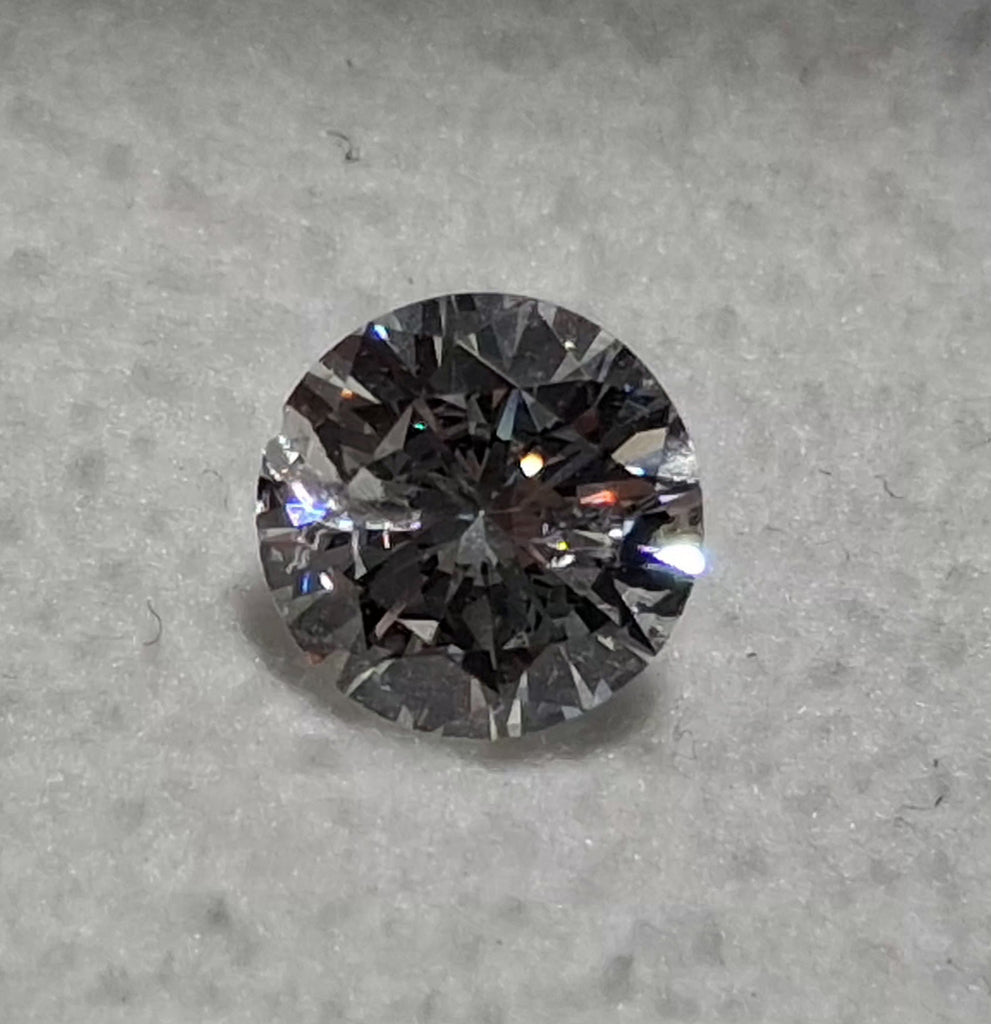 0.78 CT Natural Round Brilliant FG SI1 Chipped