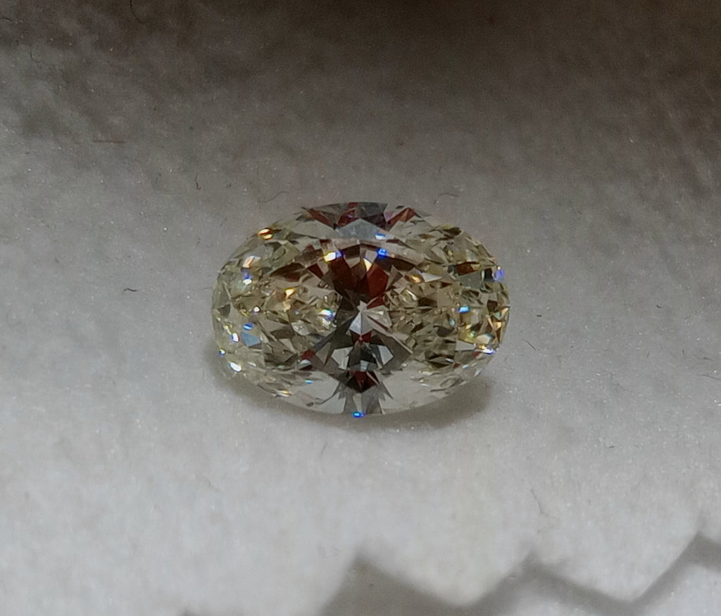 0.71 CT GIA Oval Shaped Natural Diamond K SI1