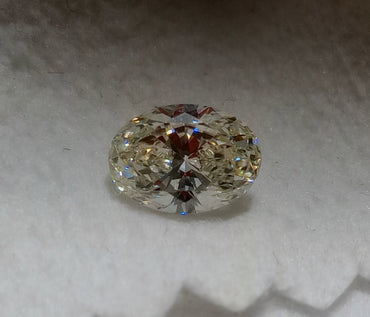 0.71 CT GIA Oval Shaped Natural Diamond K SI1