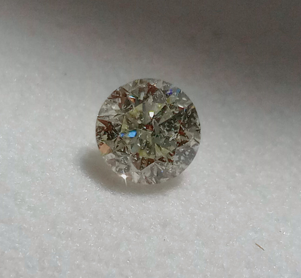 0.70 CT Round Natural Diamond K-L I2
