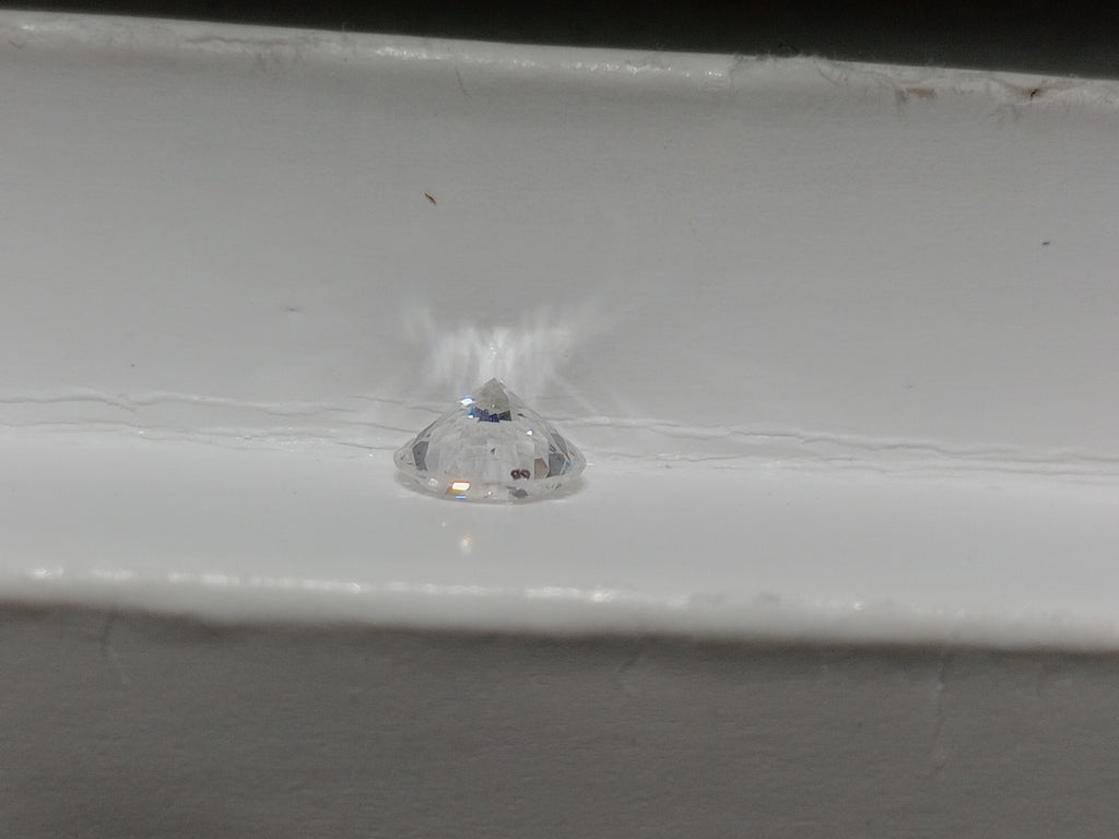 0.67 CT Round Brilliant Natural Diamond F-G SI2
