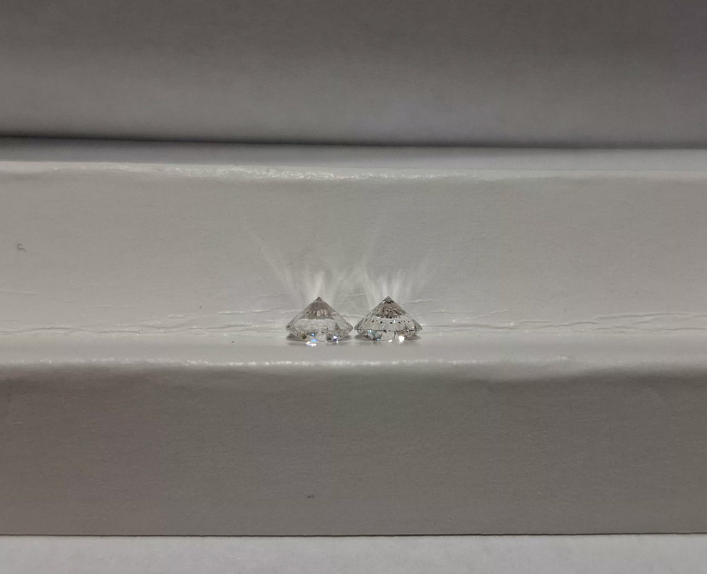 Parcel of 2 Matching Round Diamonds HI SI1-SI2 0.95 CTW